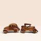Pair of small handcrafted wooden cars