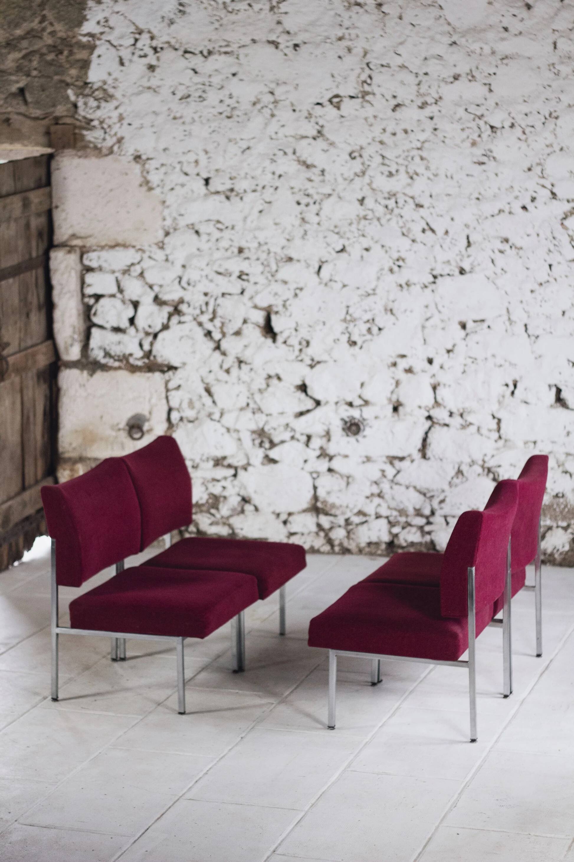 Set of 4 modernist burgundy armchairs, 1970.