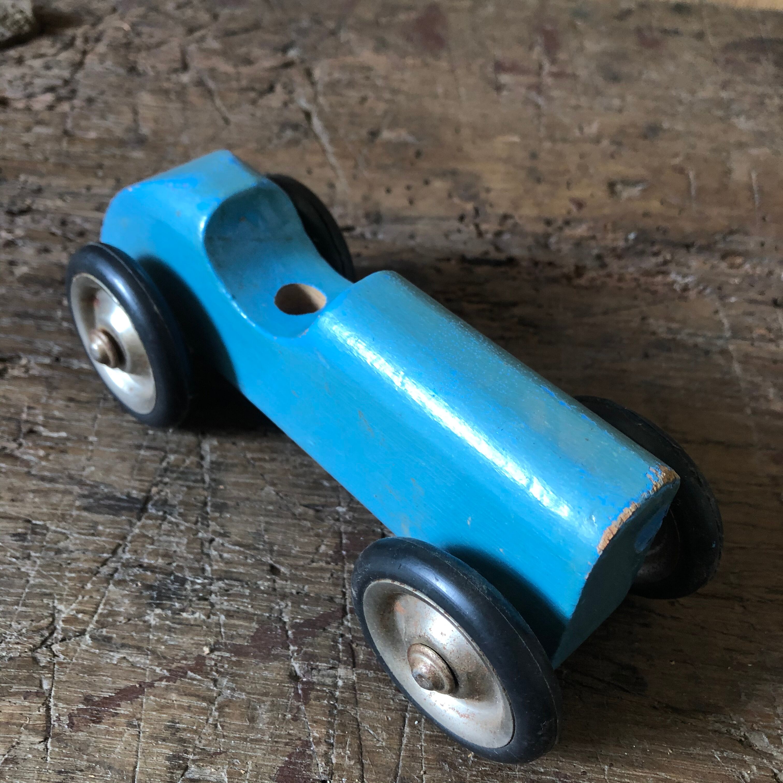 Old painted wooden toy car