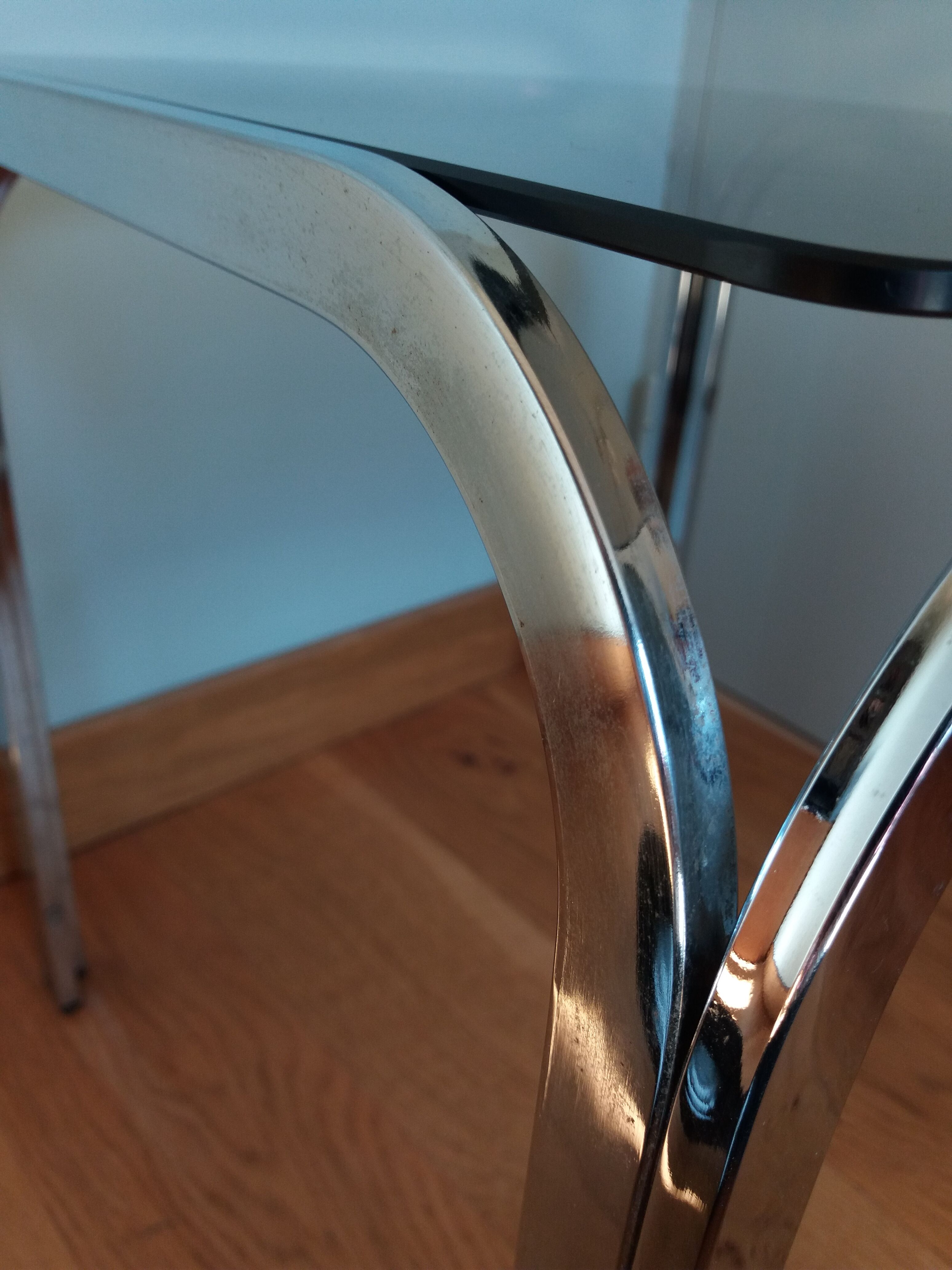 Square coffee table in chromed metal and smoked glass