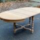 Extendable round farmhouse dining table restored in solid oak from the 19th century