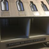 Store display for whisky and rum in metal and melamine