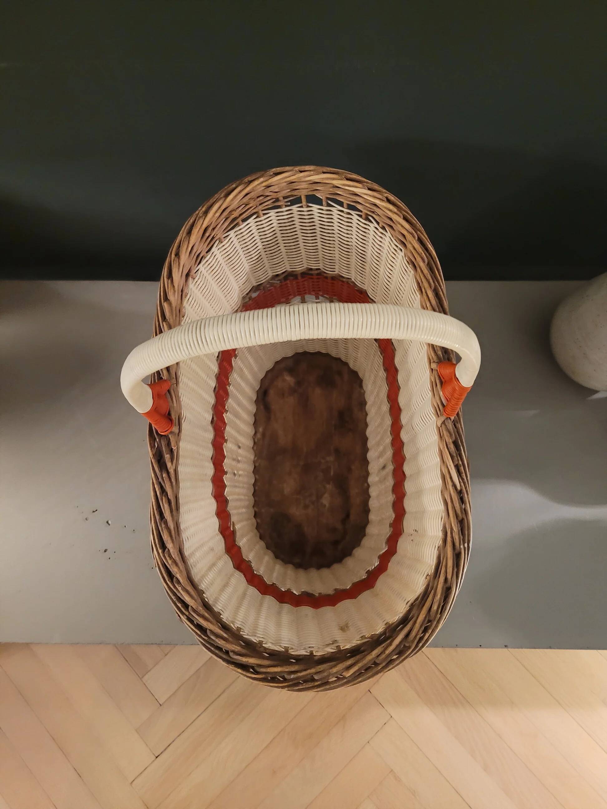 Old oval basket with a wooden base