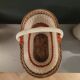 Old oval basket with a wooden base