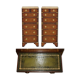 Pair of vintage military campaign high chests of drawers with leather tops.