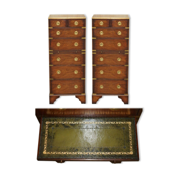 Pair of vintage military campaign high chests of drawers with leather tops.