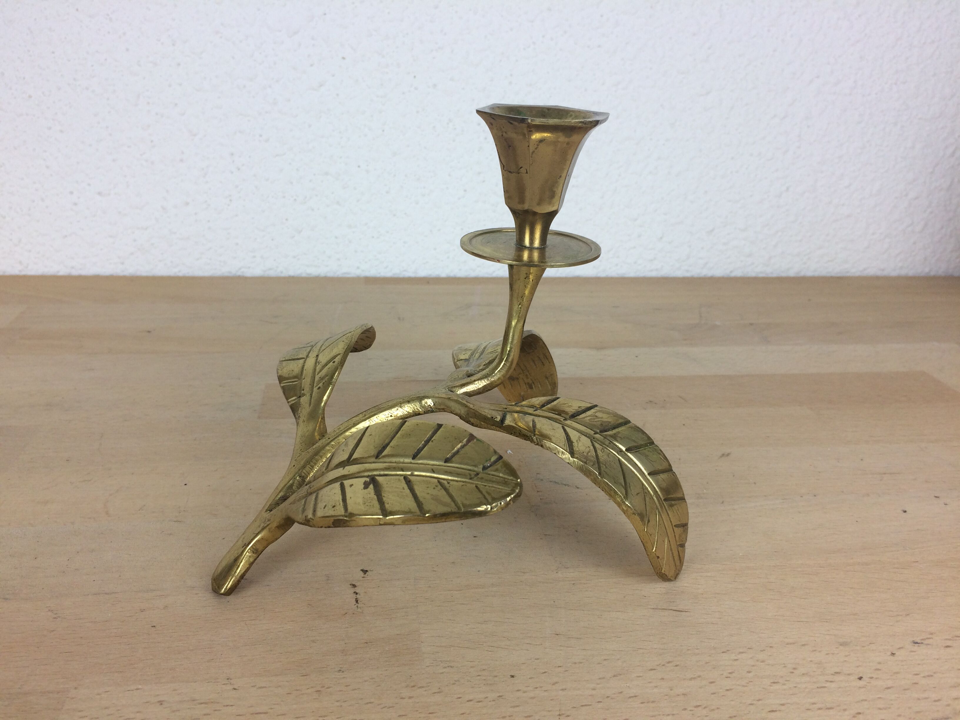 Candle holder flower leaves in golden brass