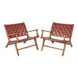 PAIR OF TEAK AND LEATHER ARMCHAIRS