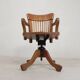 Oak office chair with adjustable spring system and height adjustment, 1950s.
