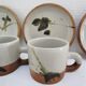 Four pottery cups and saucers from La Colombe Vallauris
