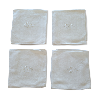 4 white monogrammed GM towels