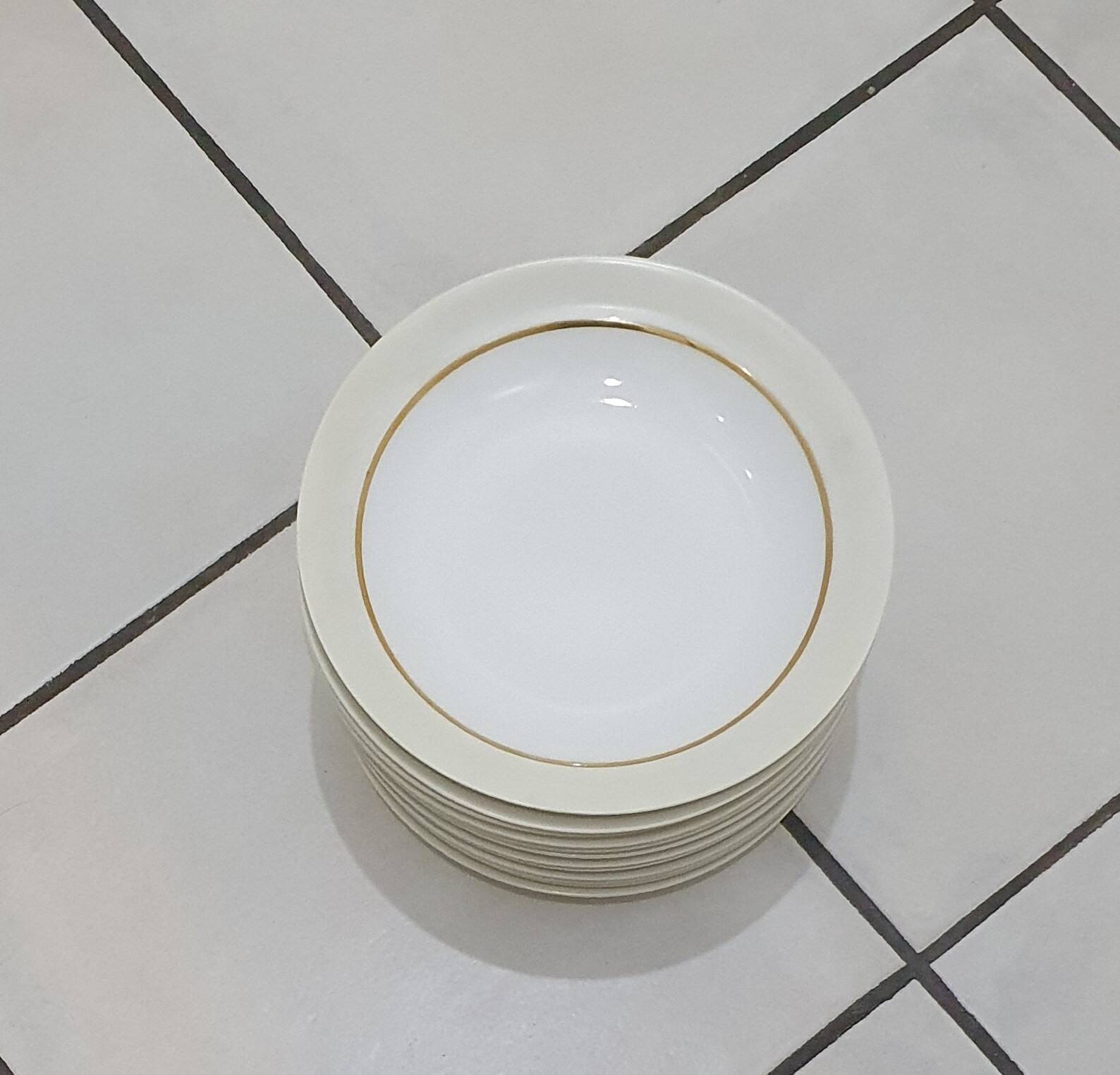 White and yellow porcelain dinner service with gold edging, Poral Limoges France