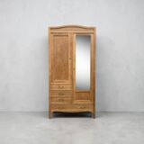 Parisian hotel wardrobe with bevelled mirror, solid raw oak, 1920.