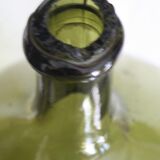 Blown green demijohn