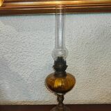 Antique kerosene lamp with yellow glass