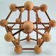 Sculptural modeling of a solid wood atom contemporary design