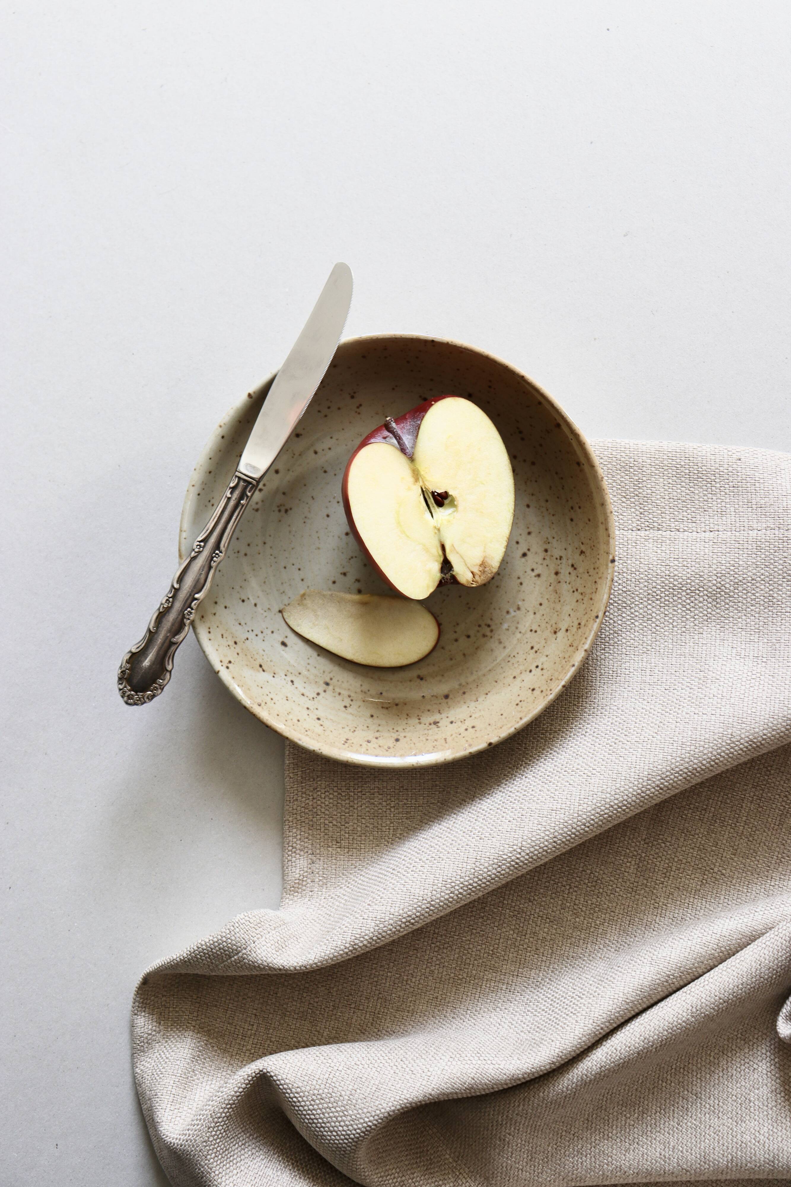 7 speckled stoneware plates