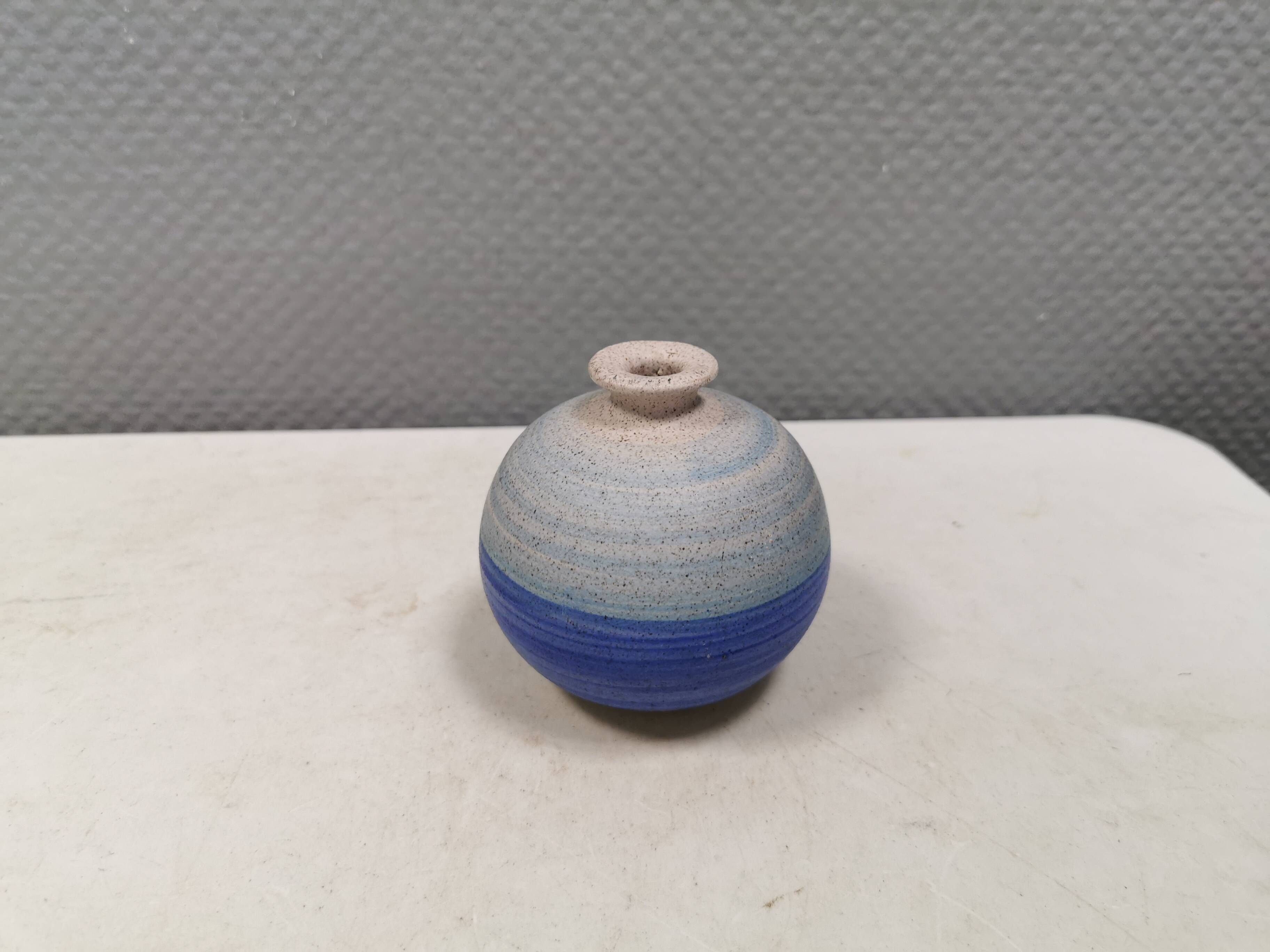 A small, round, beautiful ceramic vase from Denmark, dating from the 1980s.