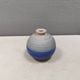 A small, round, beautiful ceramic vase from Denmark, dating from the 1980s.