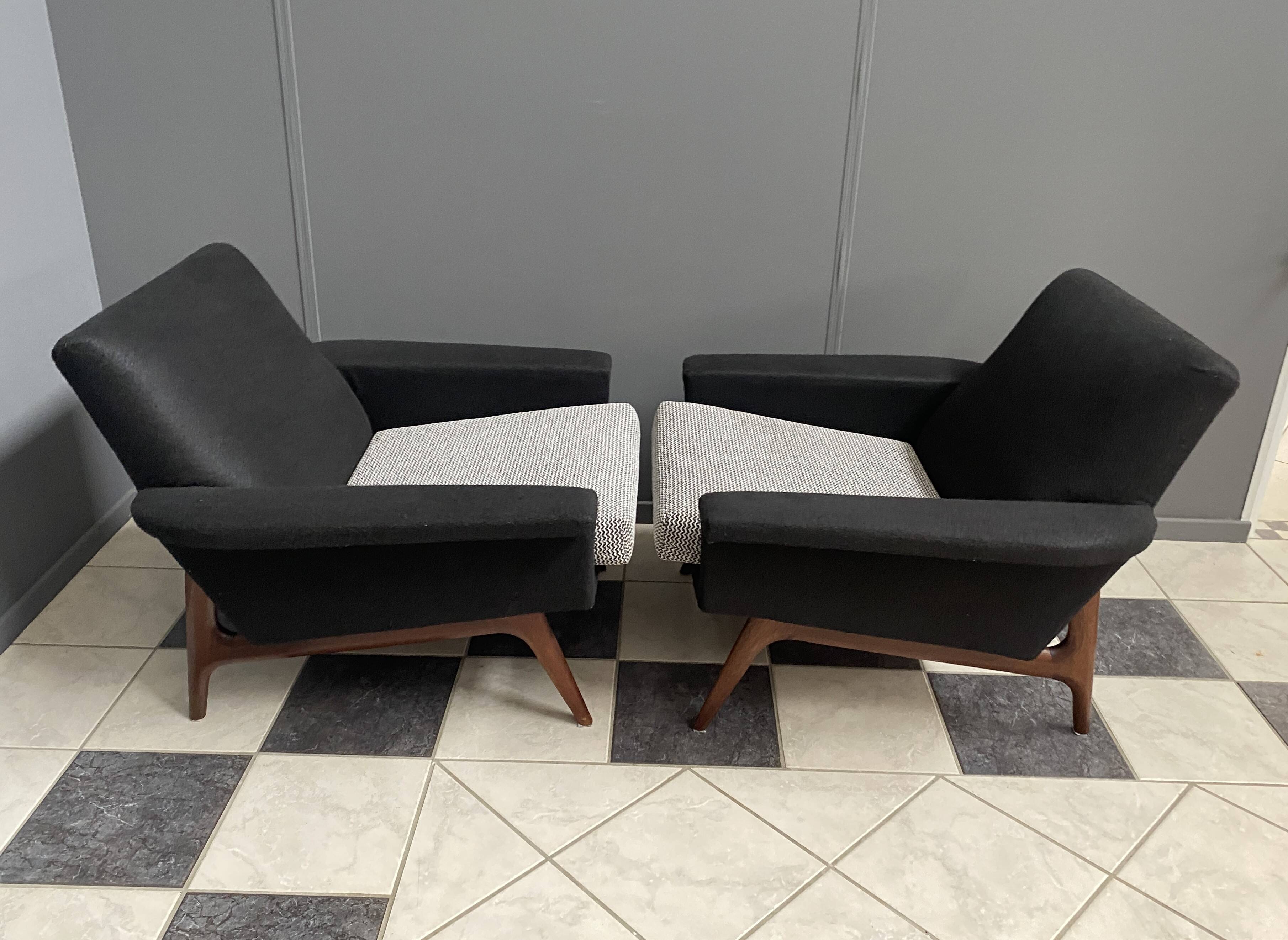 set of two black and white arm chairs 1960s