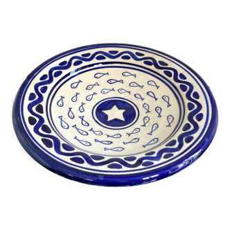 Hollow decorative ceramic plate with fish decoration