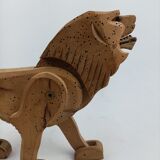Articulated wooden lion