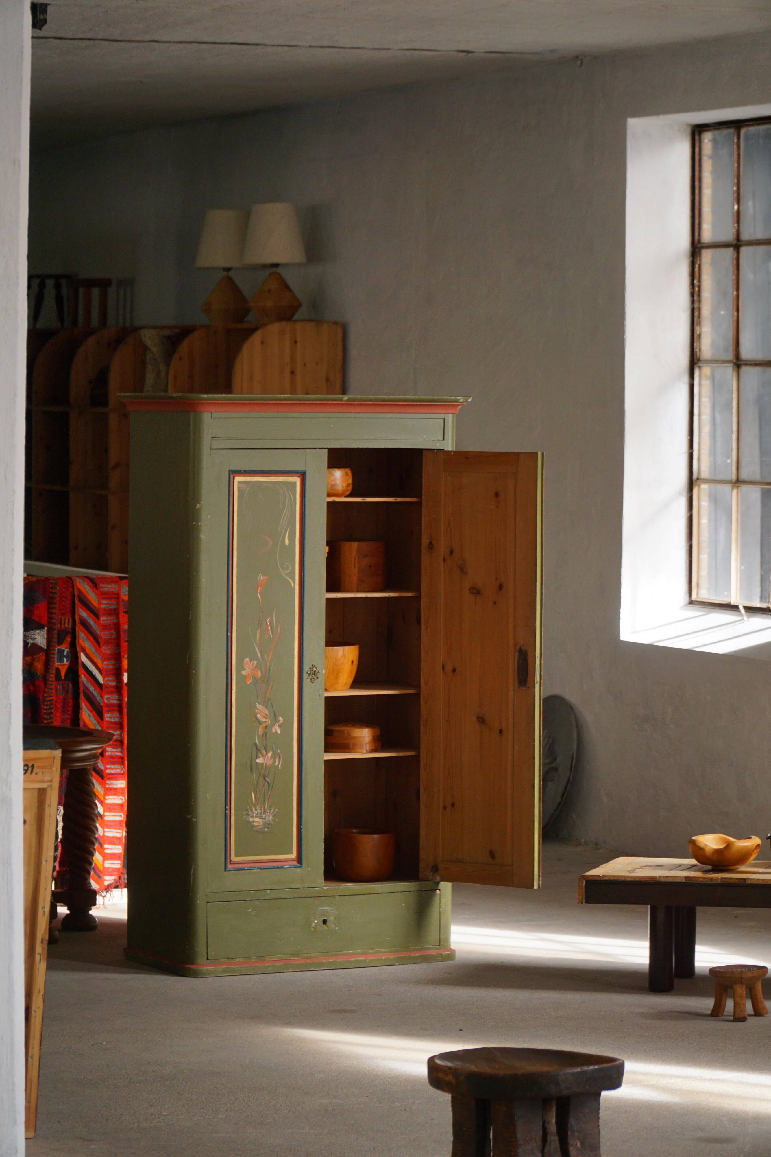 Old Danish cupboard painted with floral patterns, folk art, 19th century.