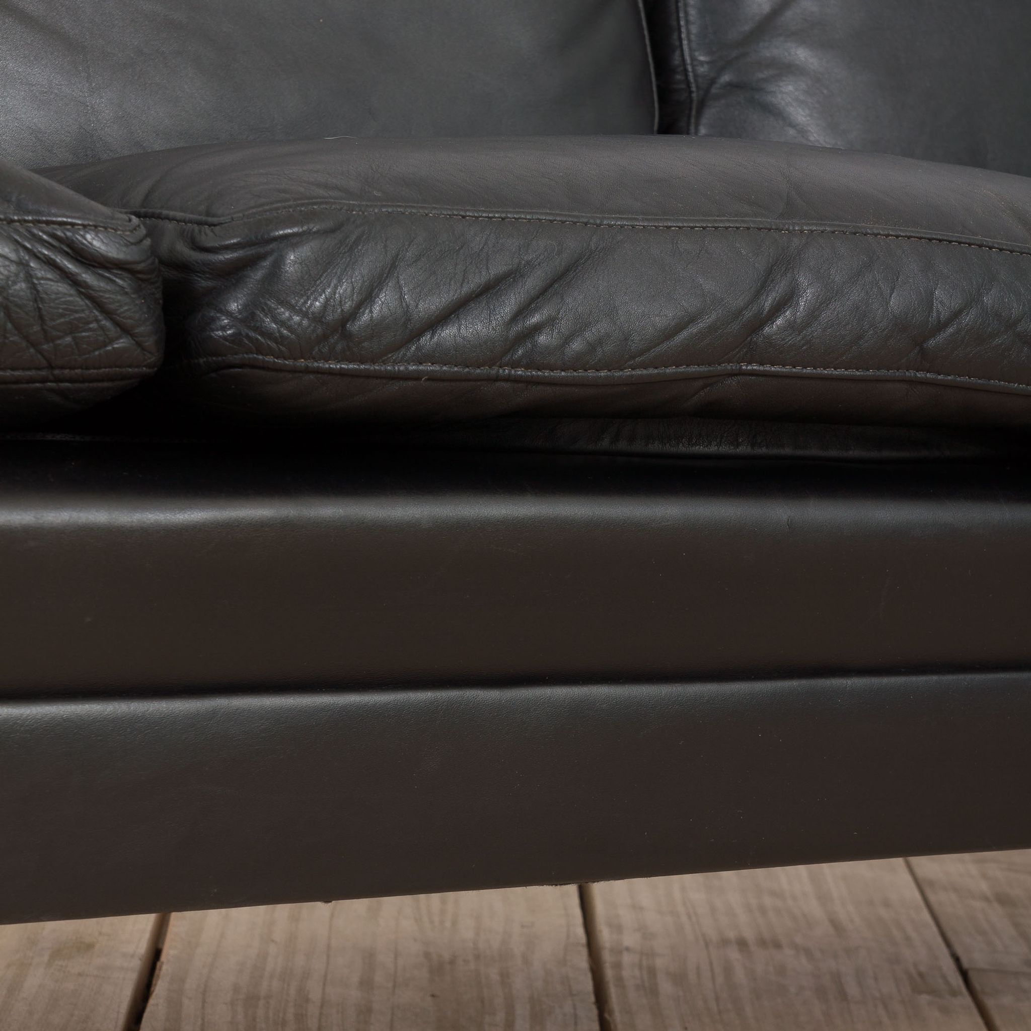 Danish black leather and rosewood sofa