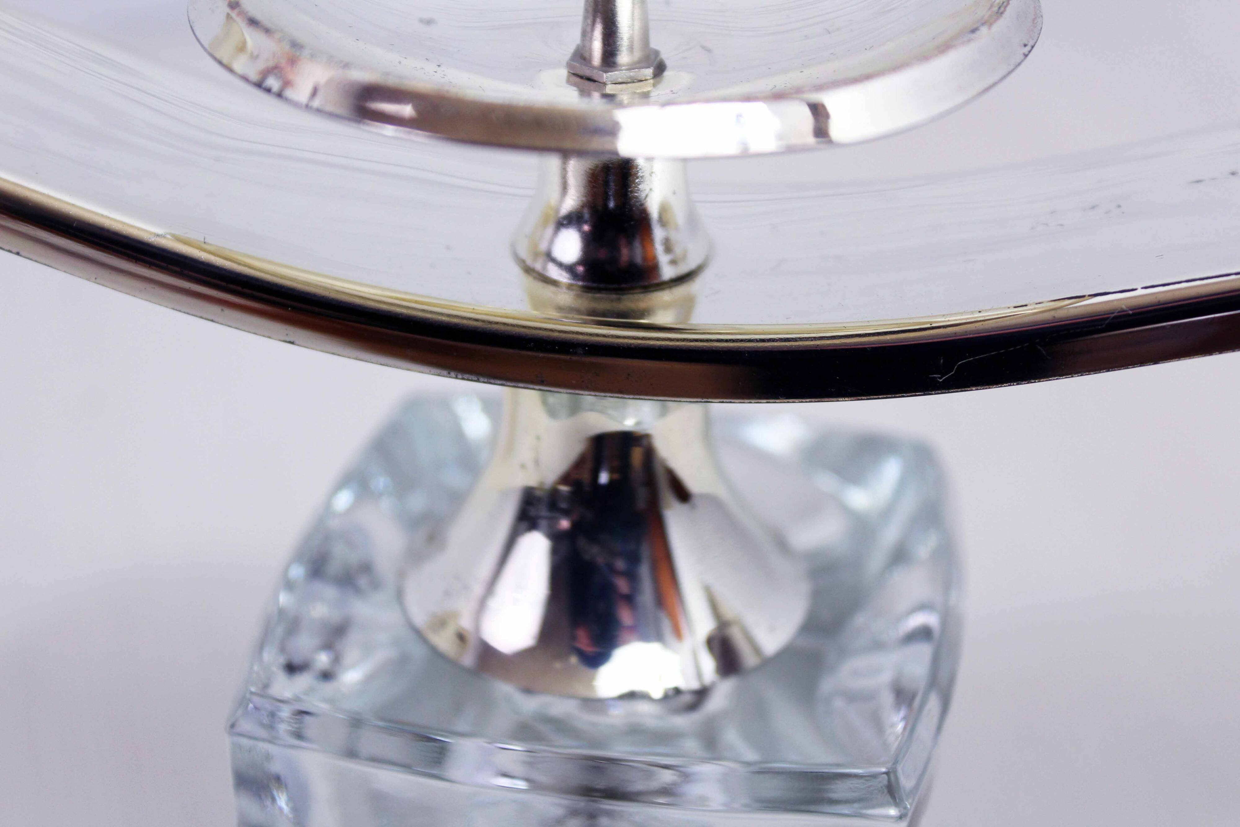 Glass and silver-plated metal candle holder