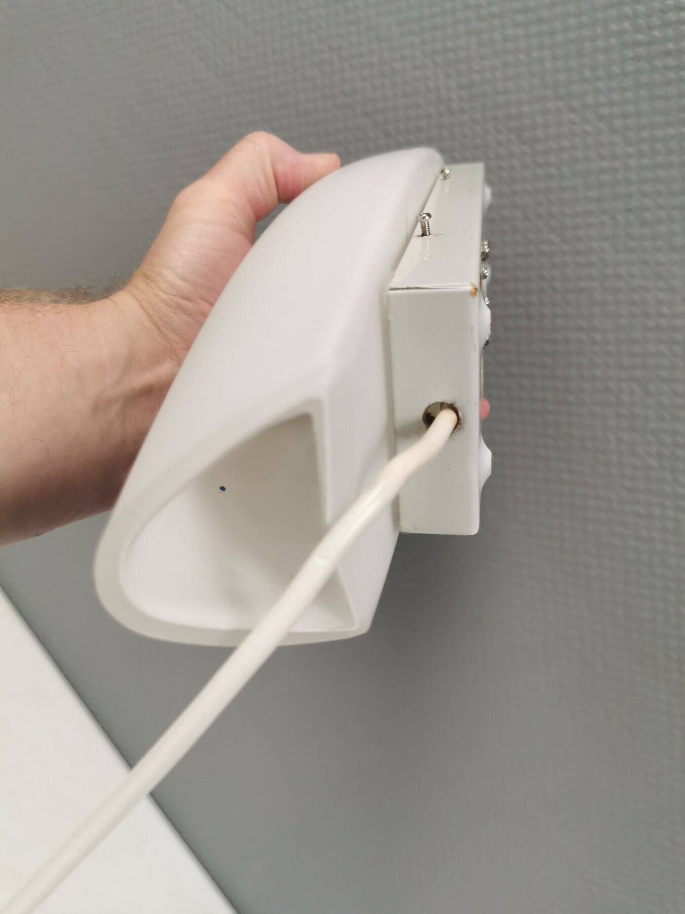 Wall lamp from Paulmann with white opal glass shade.