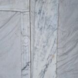 Cheminée Pompadour en marbre blanc de Carrare