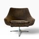 Brown vintage armchair/chair on a star base.