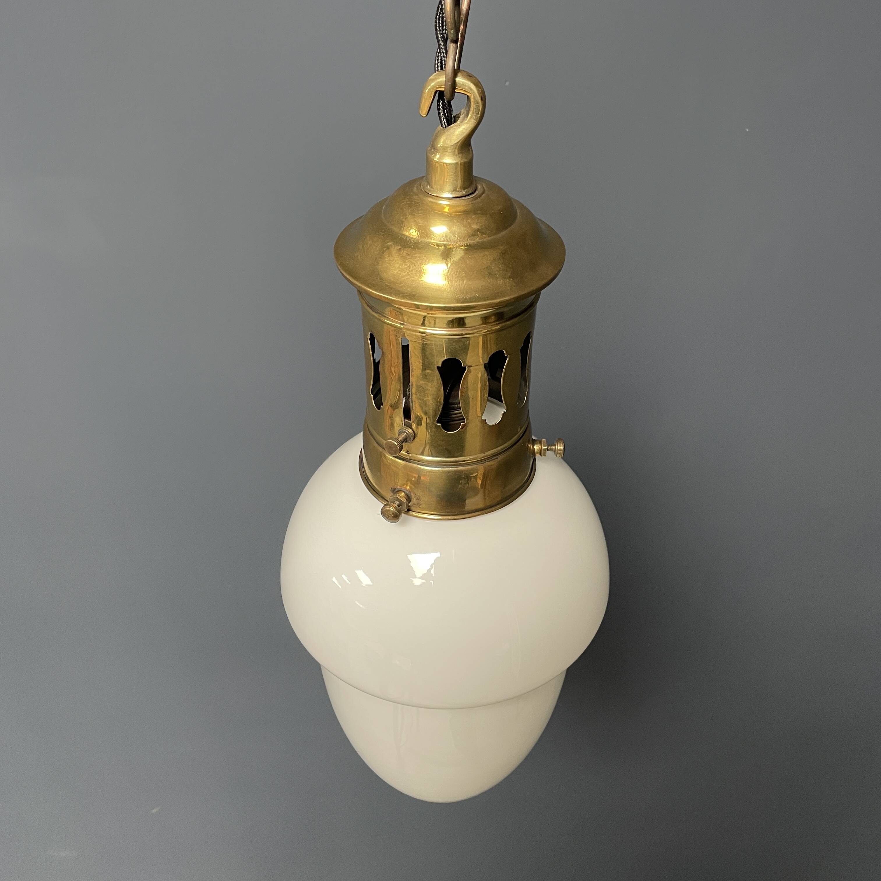 Opaline glass pendant lamp with elegant brass fixture