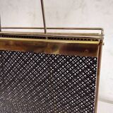 Vintage gold magazine rack from the 1960s.