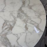 Tulip dining table in marble by Eero Saarinen for Knoll International.