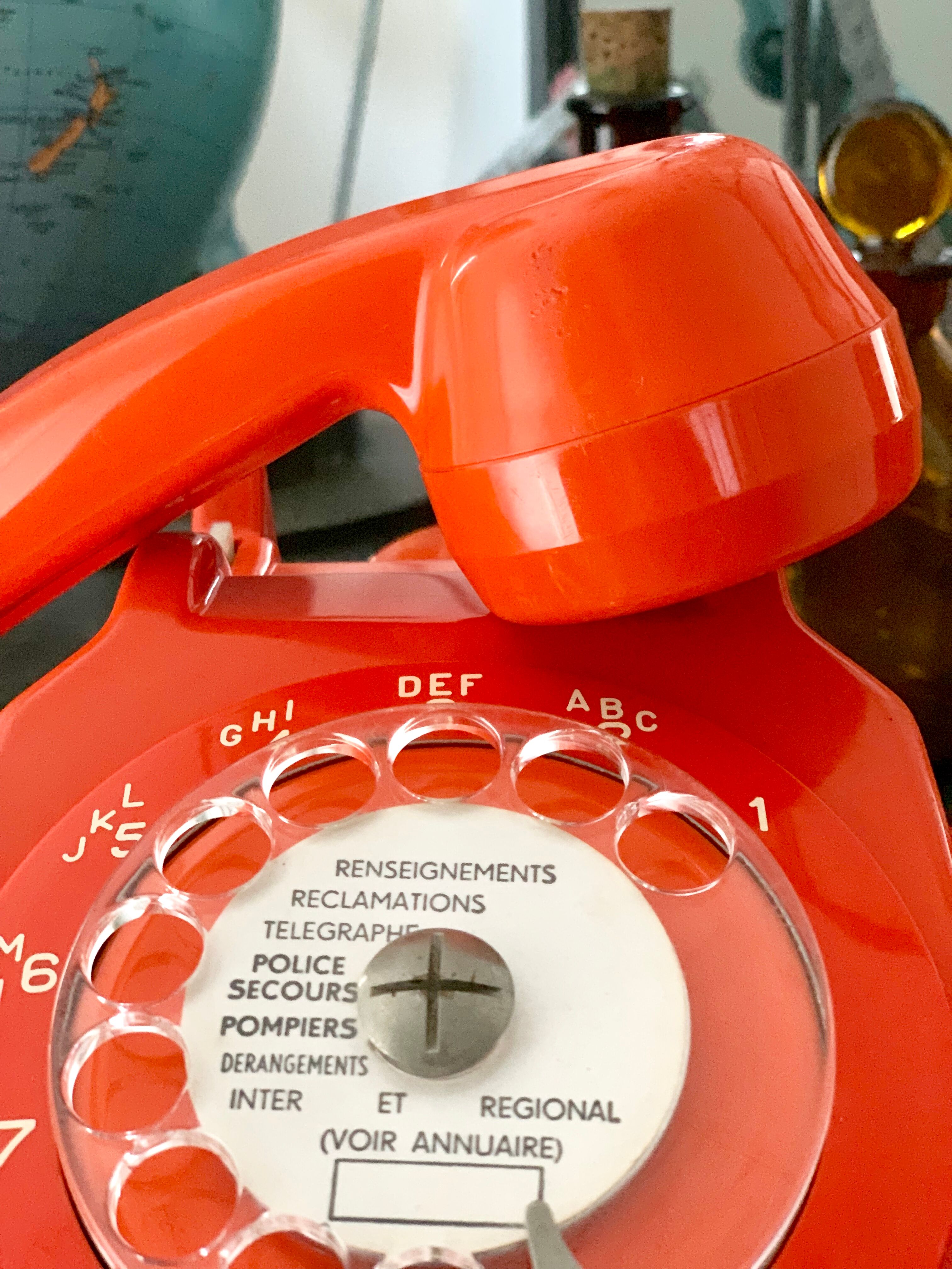 Old orange vintage dial phone