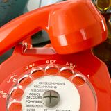 Old orange vintage dial phone