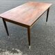 Table en palissandre avec allonges 1950