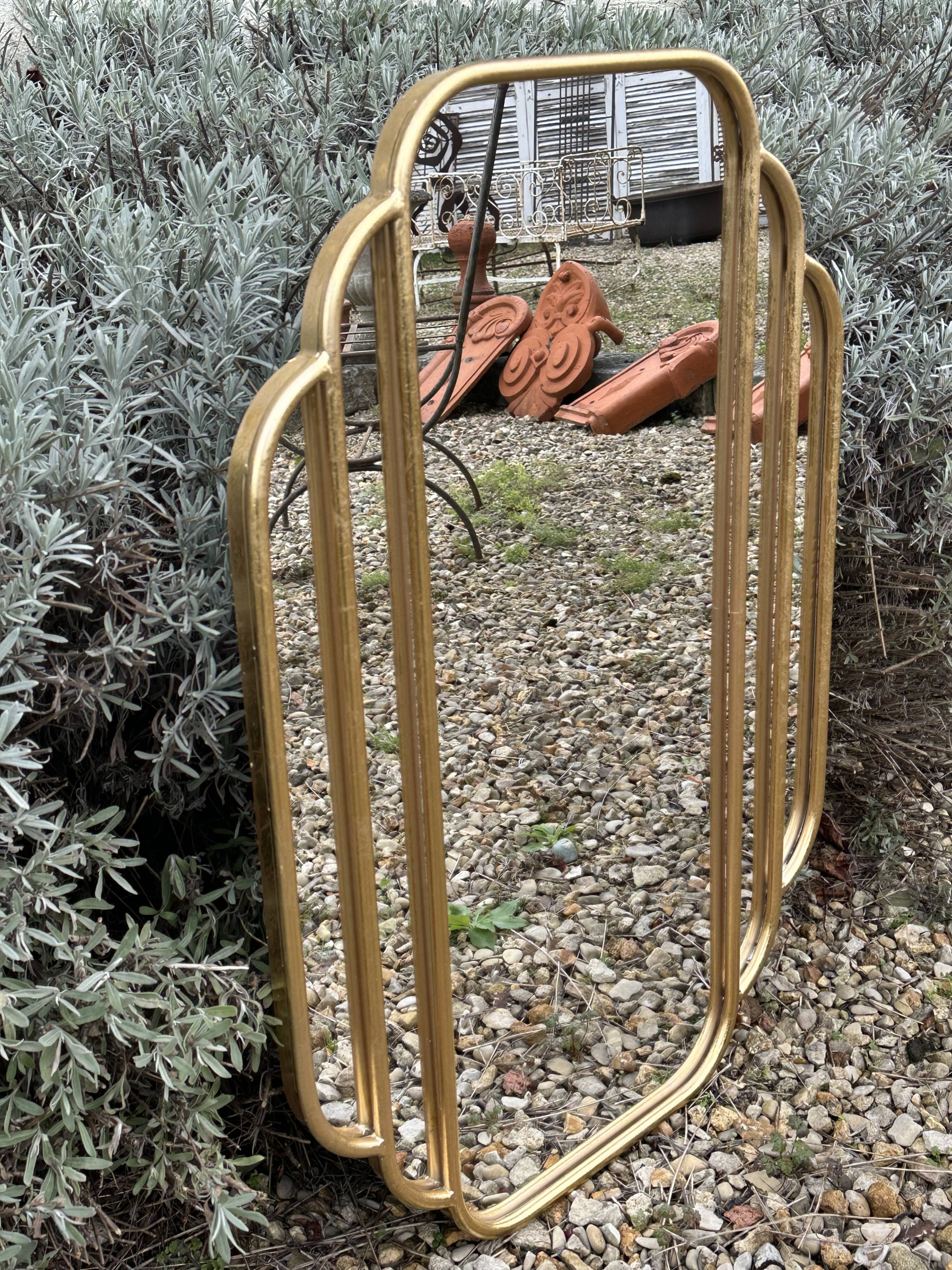 Art Deco style mirror in patinated gold iron 85 x 60 cm