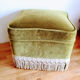 Ottoman in velvet with fringe