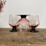 4 pink glasses with black stem