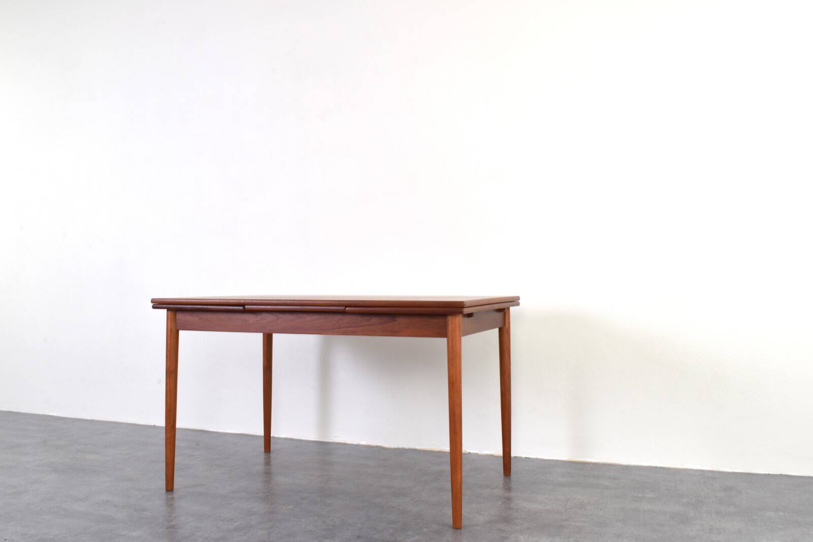 Mid-century Danish teak extendable dining table, 1960s.