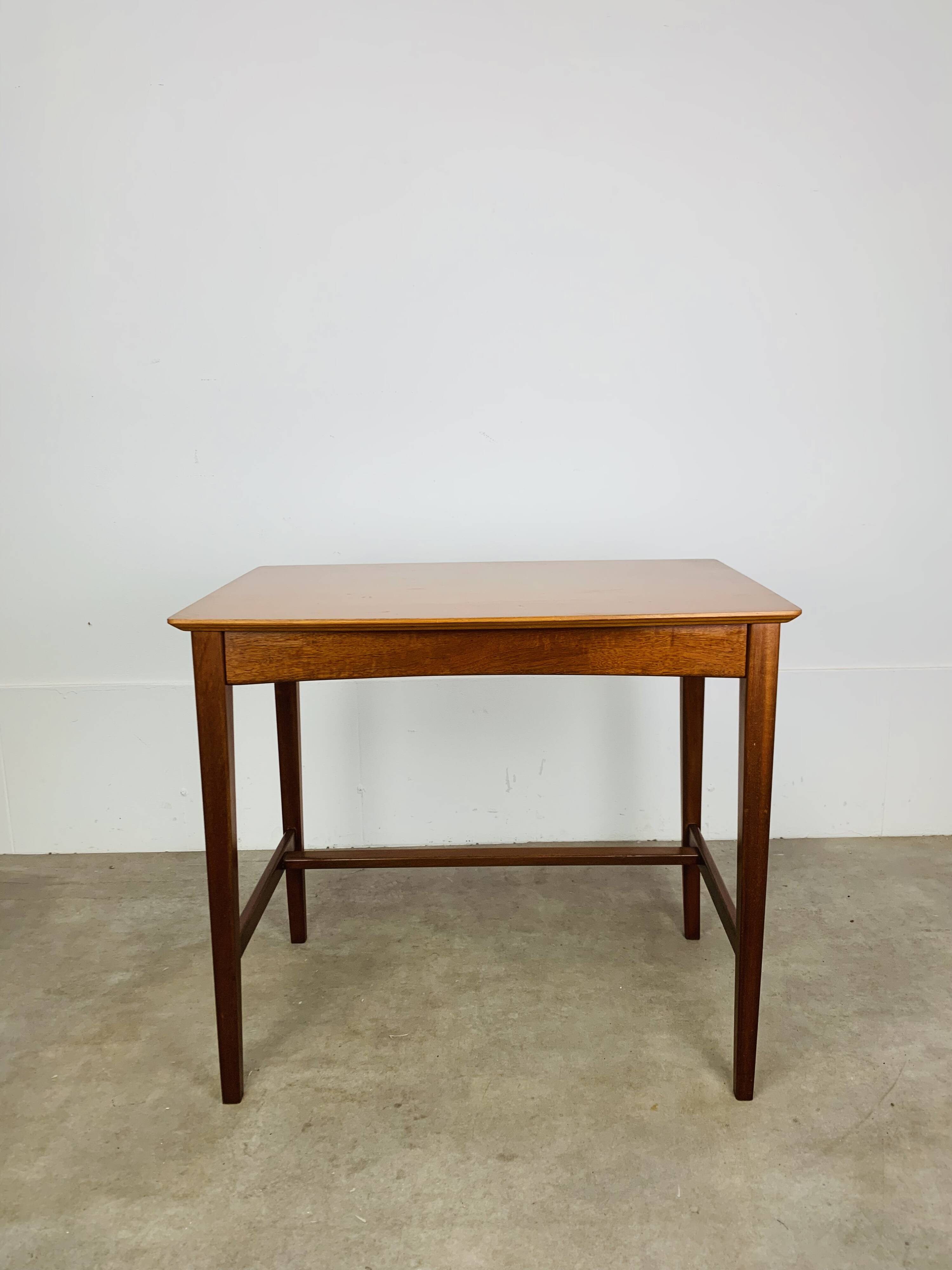 Minimalist Scandinavian teak desk from the 1960s, vintage.