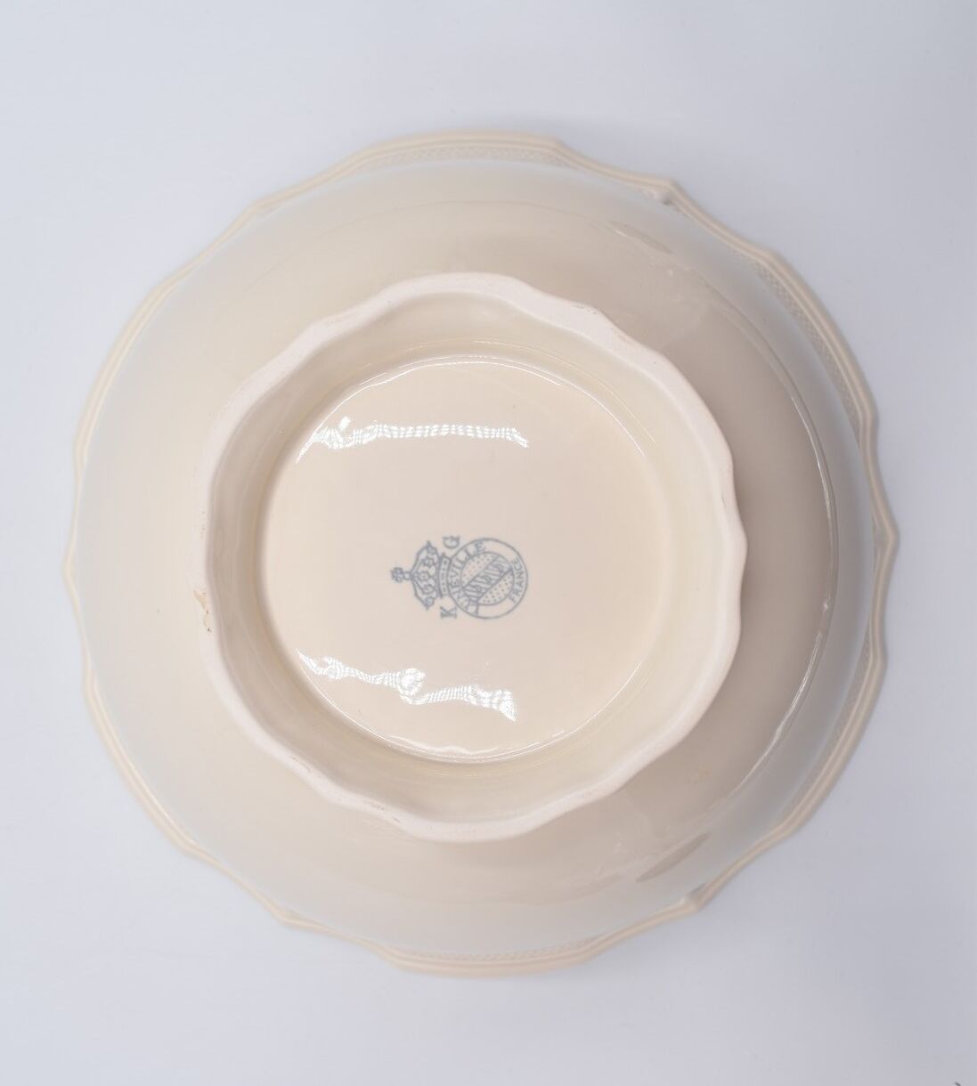 Salad bowl in off-white earthenware ivory Lunéville decoration in relief France
