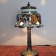 Vintage lamp in brass and ceramic. Flowering tree of life.