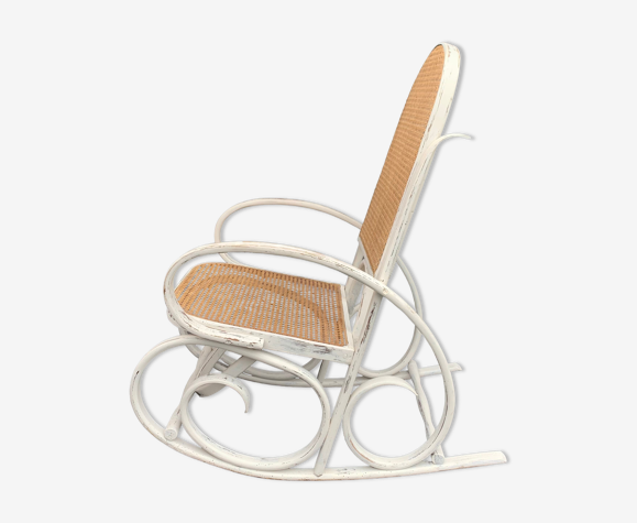 Old rocking chair with white patina