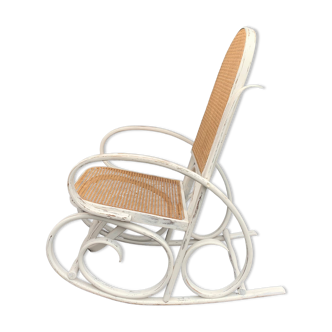 Old rocking chair with white patina