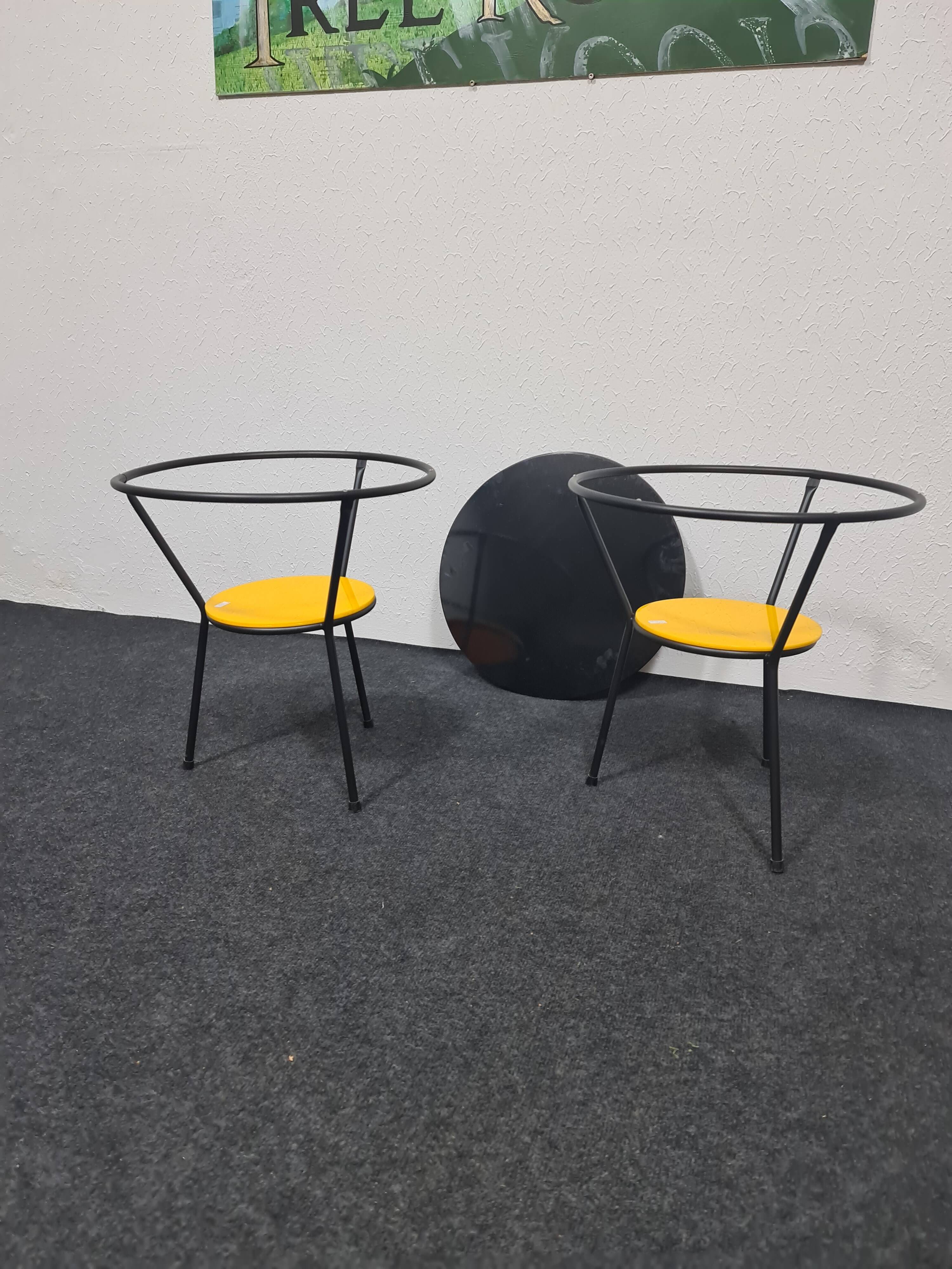 Pair of vintage glass topped side tables