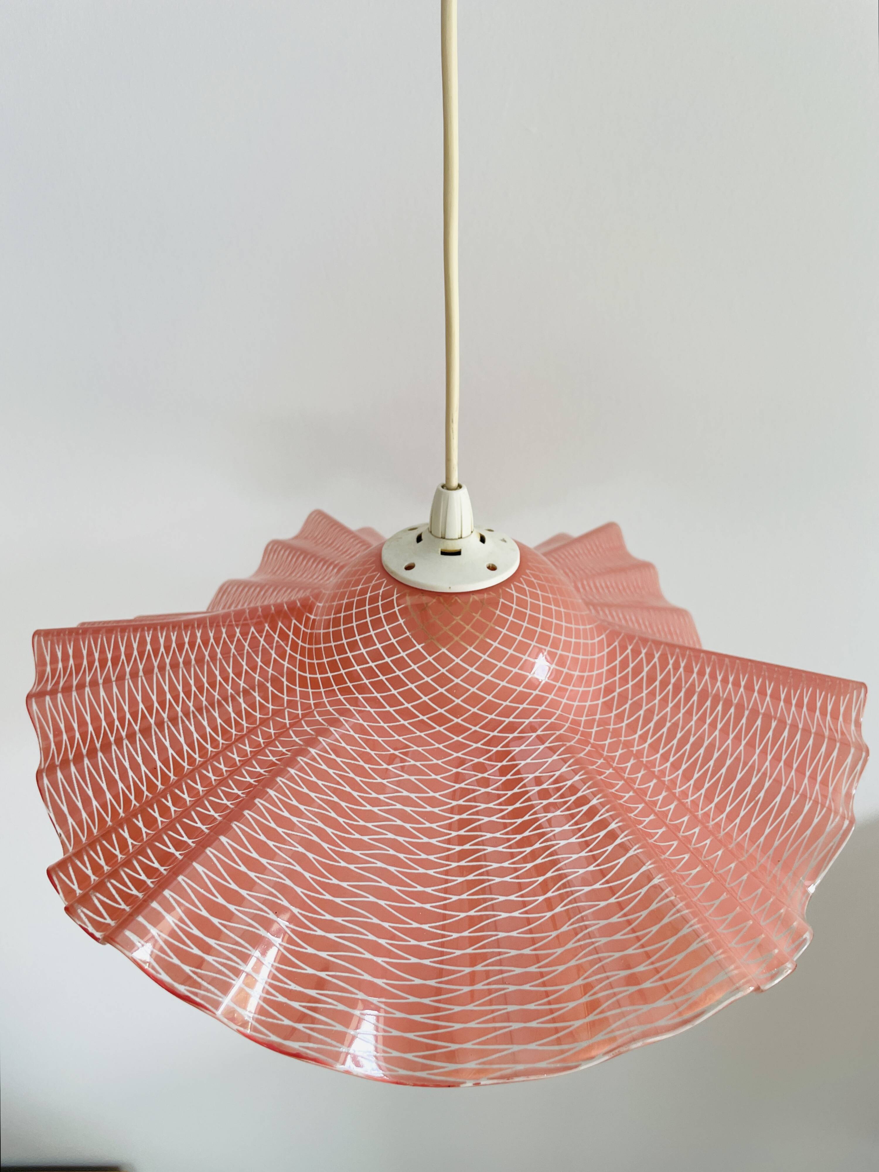 Pink molded glass pendant light