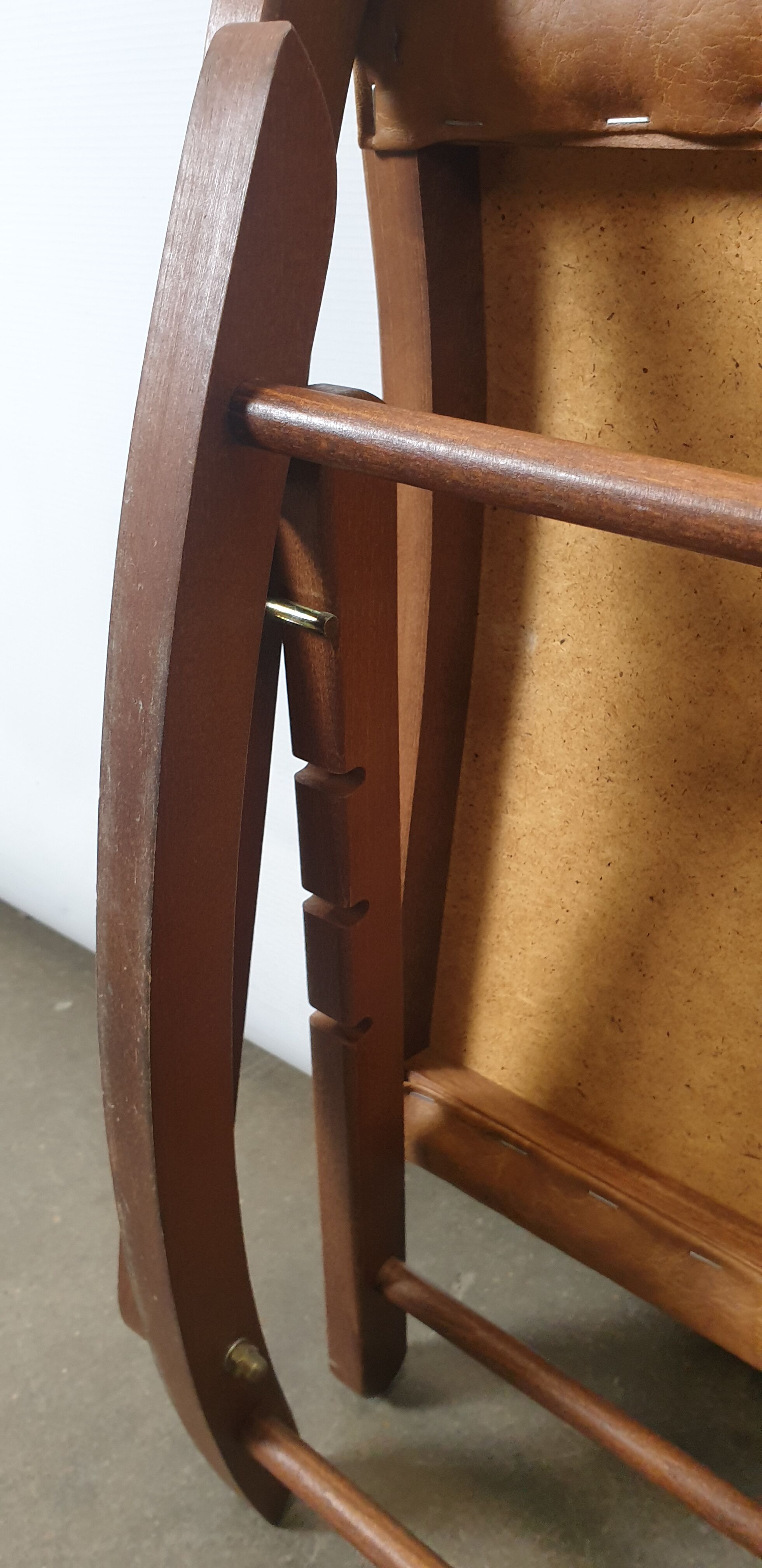 Wooden and leather folding rocking footring